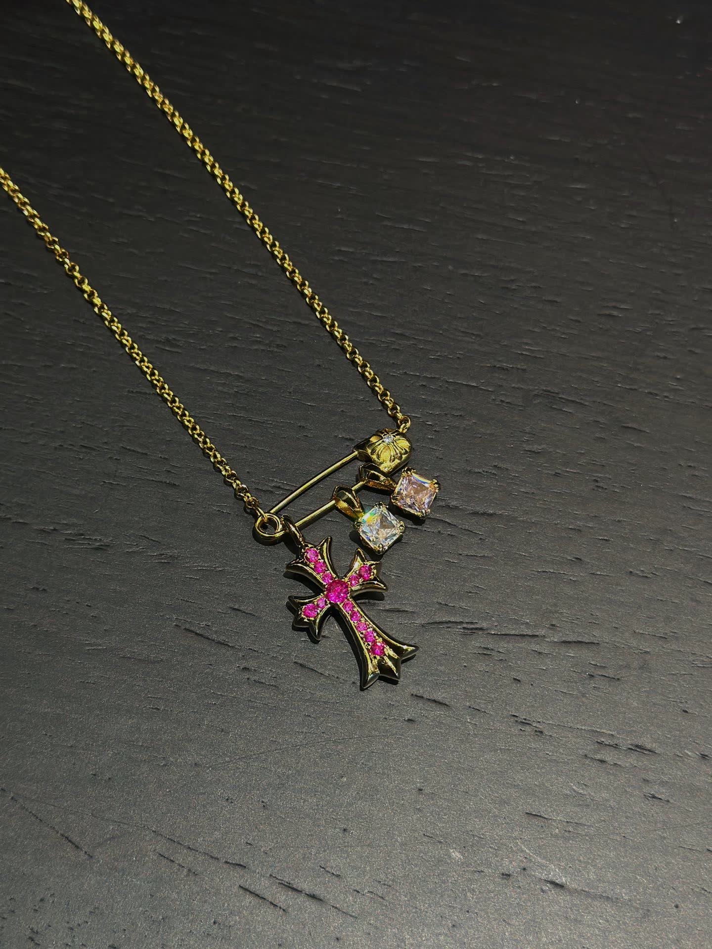 Chrome Hearts Gold Cross Pendant with Gemstones